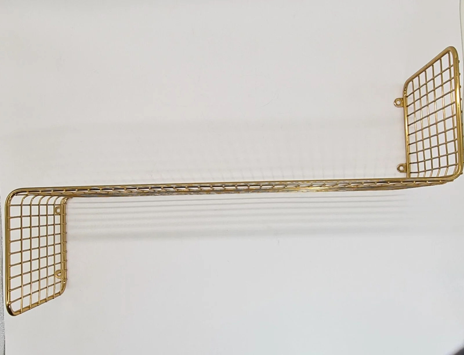 Gold wire-mesh wall shelf, 1970s