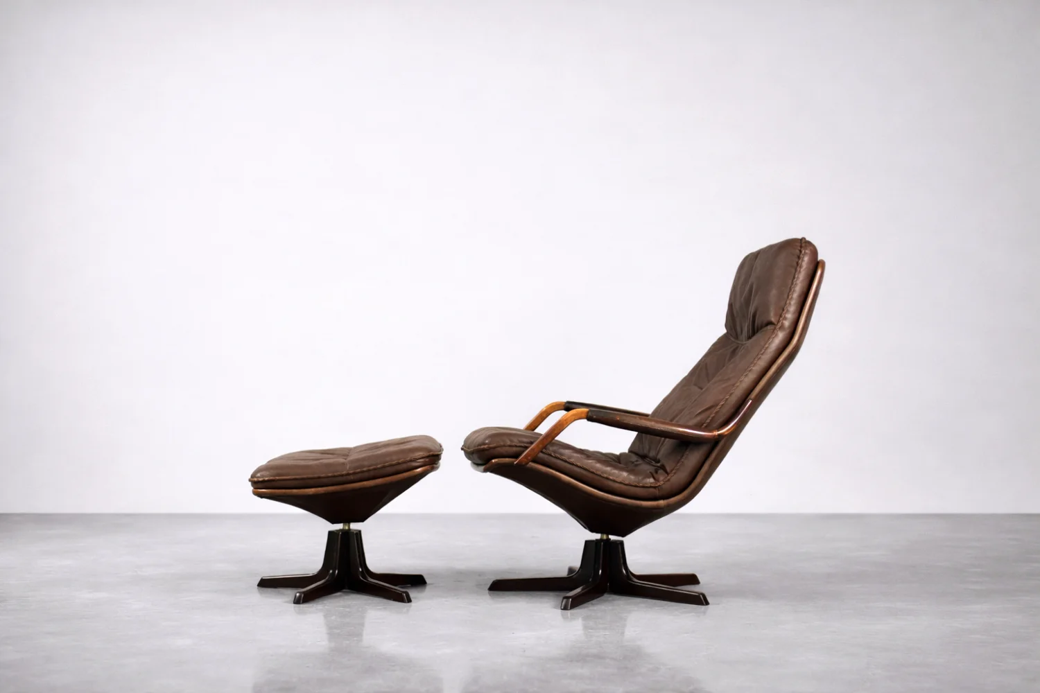 Leather armchair with footstool, Berg Furniture, Denmark, 1970s