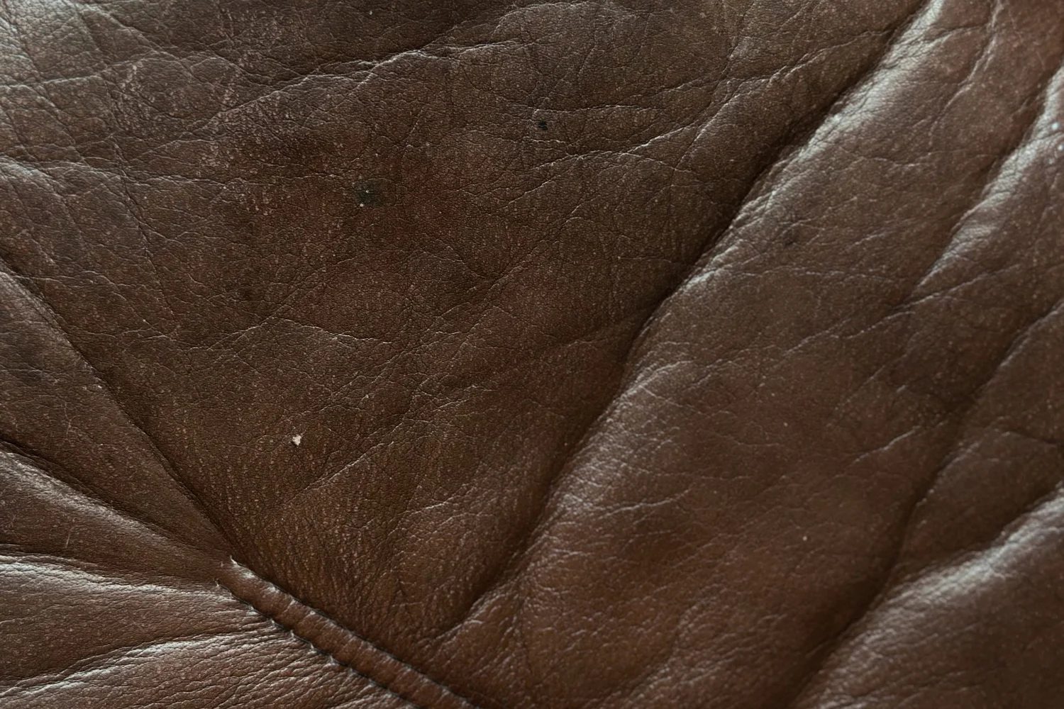 Leather armchair with footstool, Berg Furniture, Denmark, 1970s
