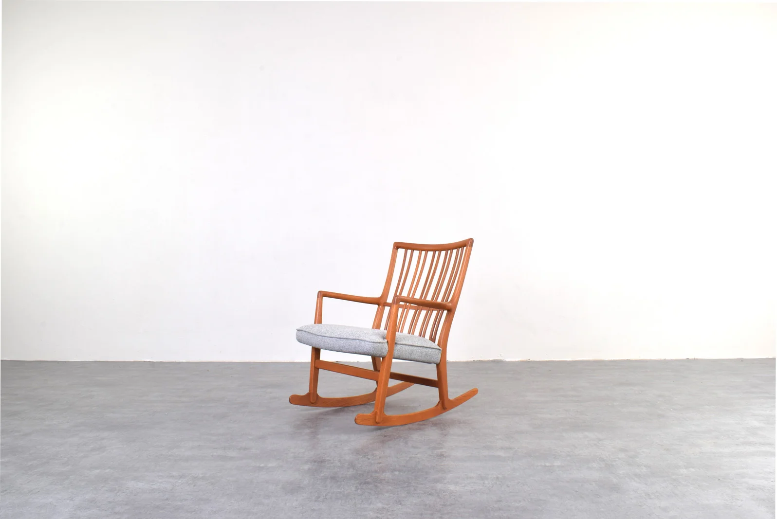 Vintage rocking chair designed by Hans Wegner, manufactured by A/S Mikael Laursen, Denmark, 1950s